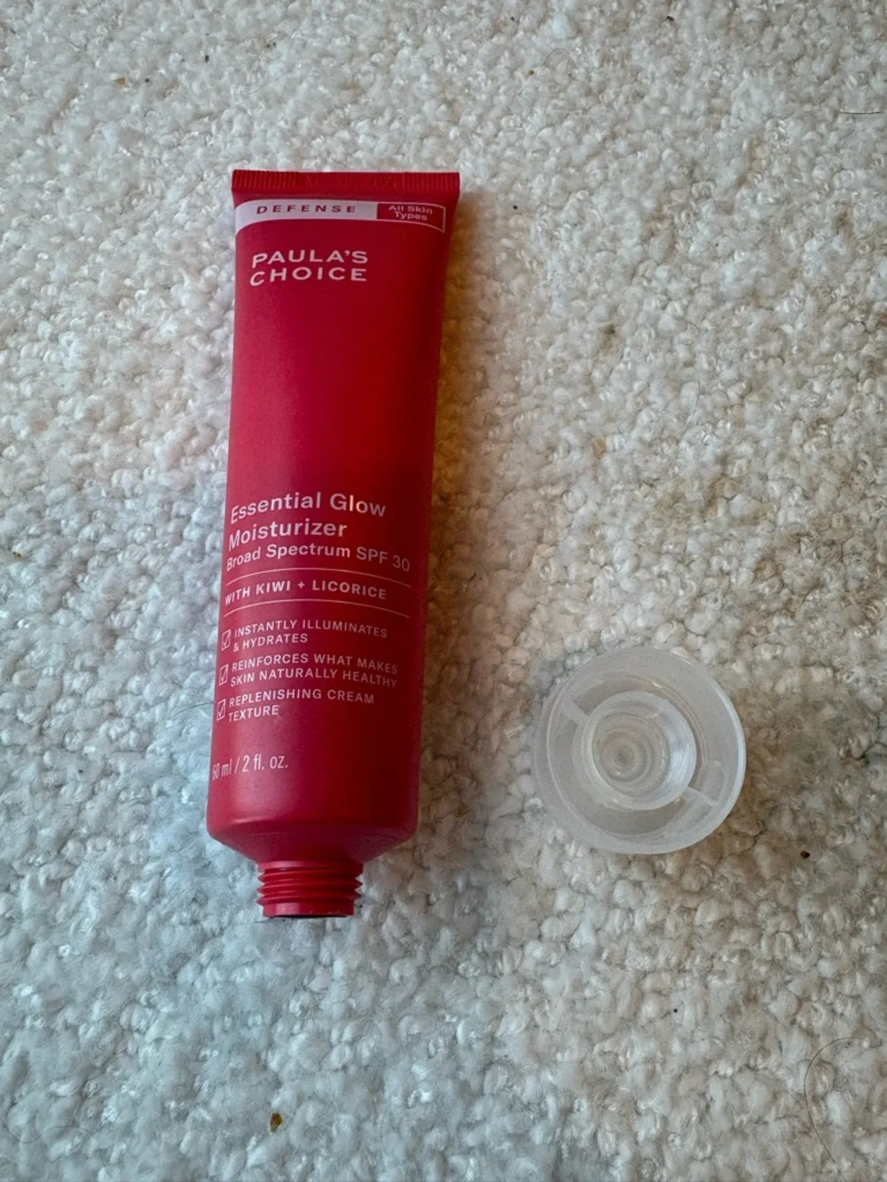 Paula's Choice Essential Glow Moisturizer Tube in Red and Clear